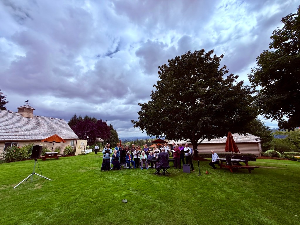 Jonathan Griffith Singers performing outdoors at Blakeslee Vineyard in Oregon